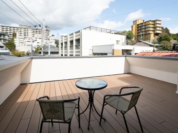 Arima Koyado Uraku : photo 1 de la chambre chambre lits jumeaux avec balcon