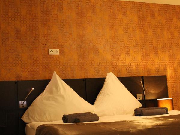 Lovely Studio Cologne West - Neues Momomotel : photo 3 de la chambre chambre double supérieure