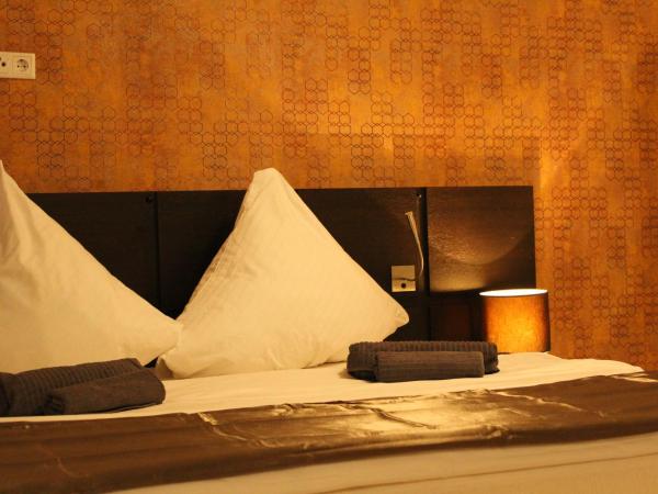 Lovely Studio Cologne West - Neues Momomotel : photo 6 de la chambre chambre double supérieure