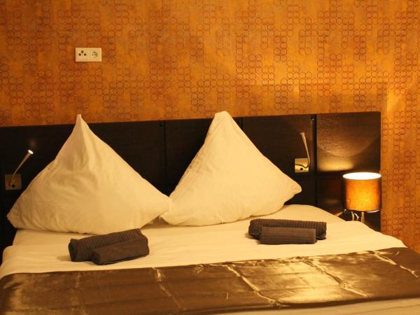 Lovely Studio Cologne West - Neues Momomotel : photo 7 de la chambre chambre double supérieure