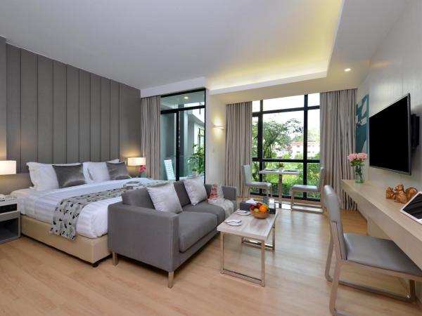 Arden Hotel and Residence by At Mind : photo 1 de la chambre chambre lits jumeaux de luxe avec vue sur la piscine