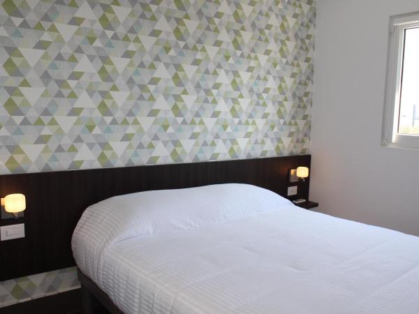 Hotel Hi! Fundidora : photo 1 de la chambre chambre lit queen-size deluxe