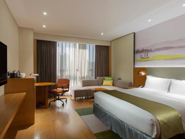 Holiday Inn & Suites Tianjin Downtown, an IHG Hotel : photo 1 de la chambre chambre king standard avec vue sur ville