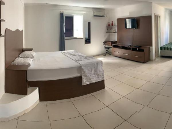 Porto das Palmeiras Hostel : photo 1 de la chambre suite lit king-size