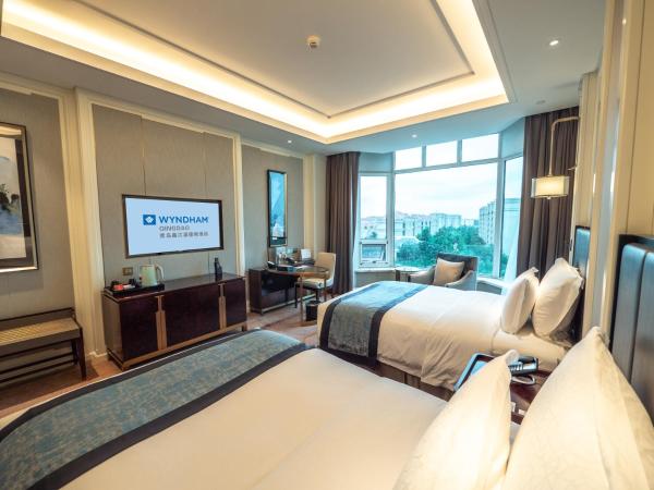Wyndham Qingdao : photo 3 de la chambre deluxe garden view room with twin bed