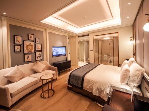 Wyndham Qingdao : photo 5 de la chambre elegant family suite with 2 king bed rooms