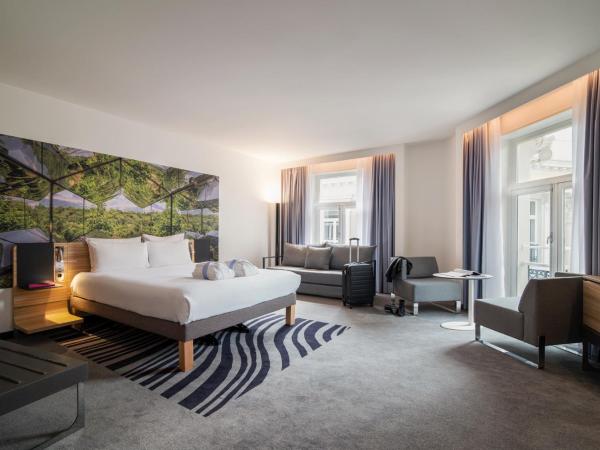 Novotel Den Haag City Centre : photo 4 de la chambre suite supérieure avec canapé