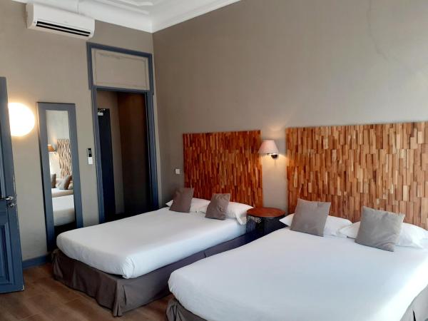 Hôtel La Villa Tosca : photo 6 de la chambre chambre quadruple standard