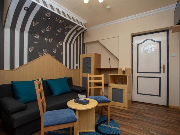 Illés Hotel : photo 7 de la chambre chambre familiale