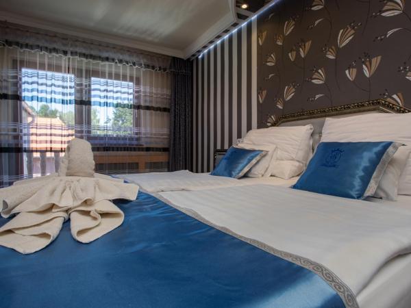 Illés Hotel : photo 10 de la chambre chambre lits jumeaux spacieuse