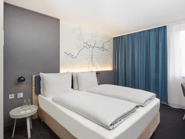 H4 Hotel Leipzig : photo 1 de la chambre chambre double ou lits jumeaux confort 