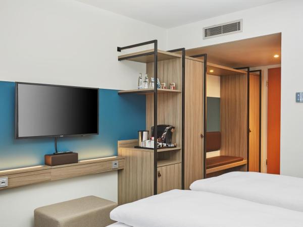 H4 Hotel Leipzig : photo 4 de la chambre chambre double ou lits jumeaux confort 
