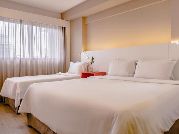 Intercity Curitiba Centro Cívico : photo 2 de la chambre luxury triple - 1 queen bed and 1 single bed