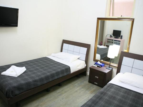 Central Private Hotel : photo 3 de la chambre chambre lits jumeaux avec salle de bains privative