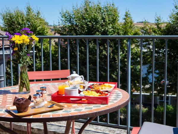 Hôtel Le Maxime - Best Western Signature Collection : photo 2 de la chambre suite lit king-size avec vue - non-fumeurs