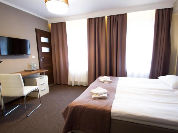 Hotel Kolorowa : photo 5 de la chambre chambre lits jumeaux supérieure - vue sur ville