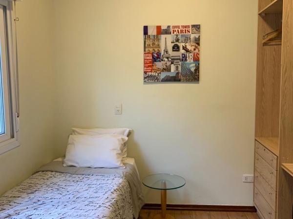 Vila Stellino Suítes : photo 1 de la chambre grande chambre simple