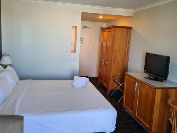 Airport Heritage Motel : photo 2 de la chambre chambre lit king-size deluxe