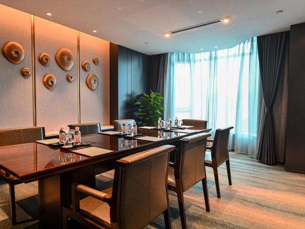 Wyndham Qingdao : photo 8 de la chambre elegant family suite with 2 king bed rooms