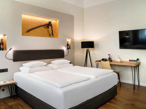 Hotel Rathaus - Wein & Design : photo 1 de la chambre chambre familiale