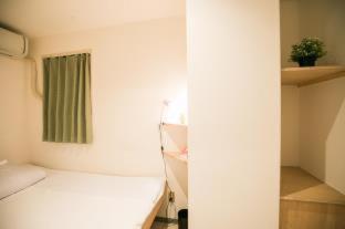 123 Guesthouse : photo 10 de la chambre room #243680426