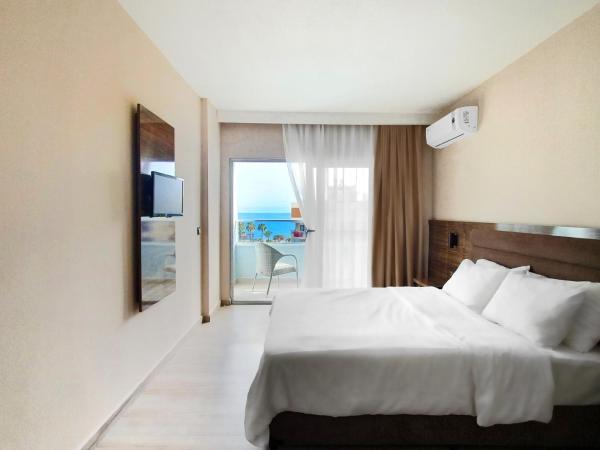 Ozgur Bey Spa Hotel : photo 5 de la chambre chambre lit queen-size - vue sur mer