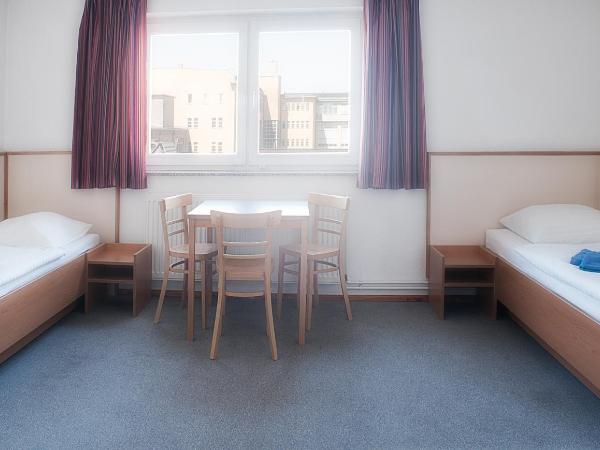 Steps-Hotel : photo 2 de la chambre appartement avec salle de bains