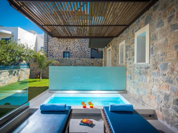 Balsamico Traditional Suites : photo 1 de la chambre chambre double avec baignoire spa