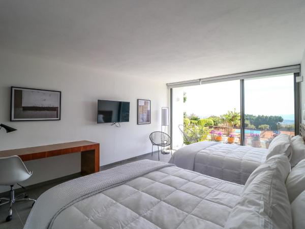 Villa Internacional Hotel & Club : photo 2 de la chambre chambre deluxe double ou lits jumeaux