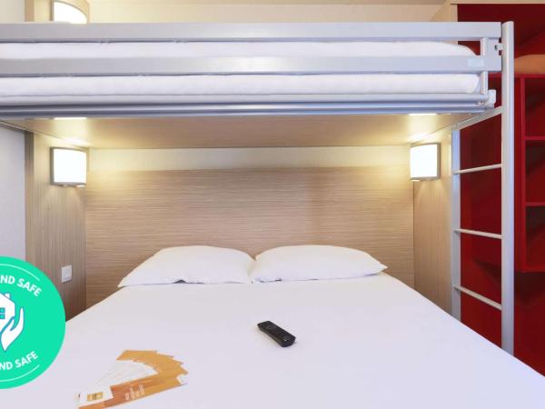 Première Classe Chalon Sur Saône : photo 2 de la chambre chambre triple (1 lit double et 1 lit simple)