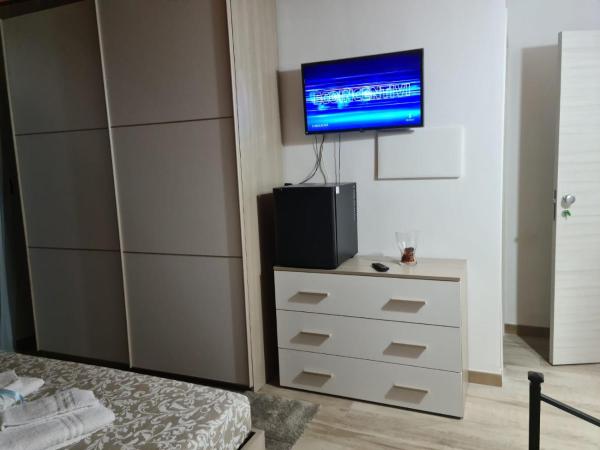 B&B Villa Chiara Bed and Breakfast : photo 9 de la chambre chambre double ou lits jumeaux deluxe – vue sur jardin