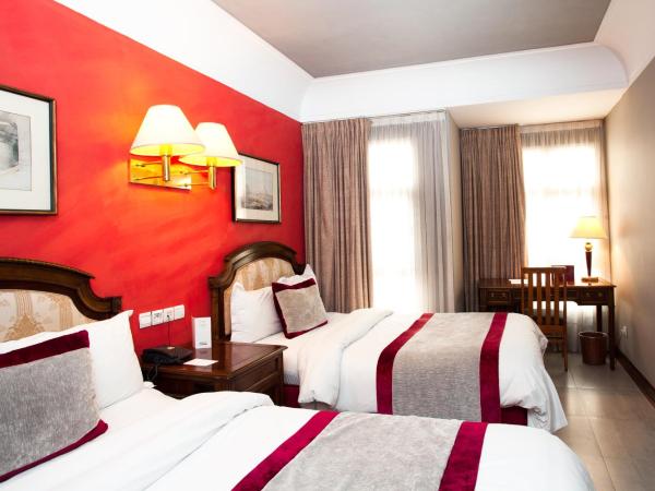 Hôtel Les Saisons : photo 7 de la chambre chambre lits jumeaux