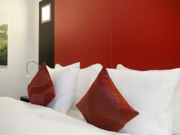 Ramada Encore by Wyndham Geneva : photo 6 de la chambre suite lit king-size avec canapé-lit - non-fumeurs