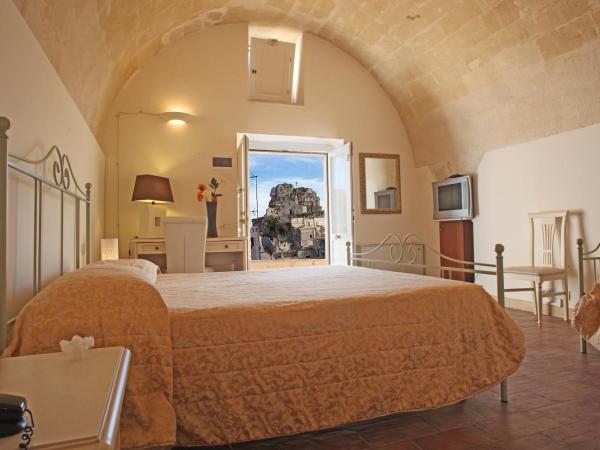 Caveoso Hotel : photo 5 de la chambre chambre double ou lits jumeaux