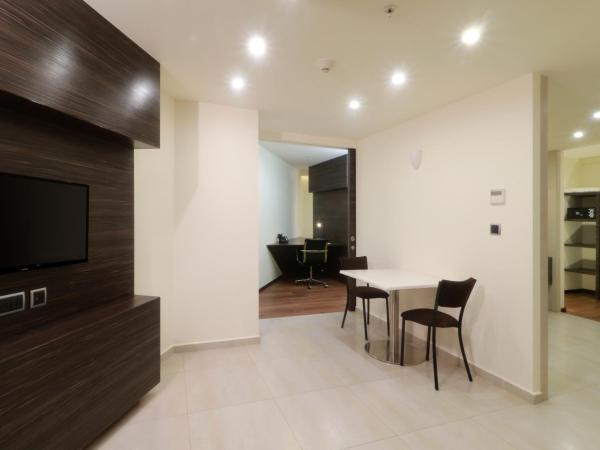 Holiday Inn Express Mexico Aeropuerto, an IHG Hotel : photo 1 de la chambre suite lit king-size