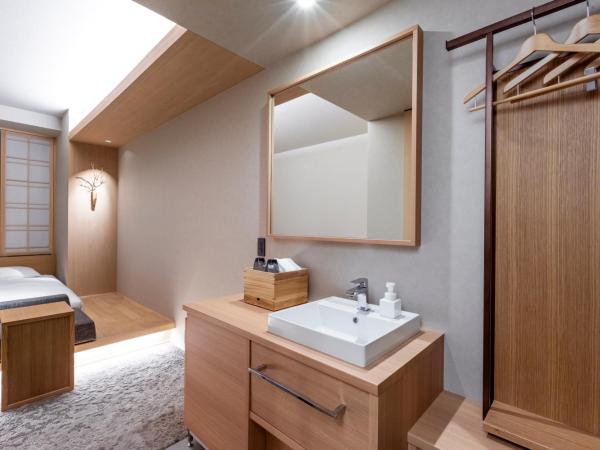 ONSEN RYOKAN Yuen Sapporo : photo 2 de la chambre chambre double avec douche - Étage supérieur - non-fumeurs