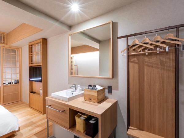 ONSEN RYOKAN Yuen Sapporo : photo 2 de la chambre chambre double avec douche - non-fumeurs