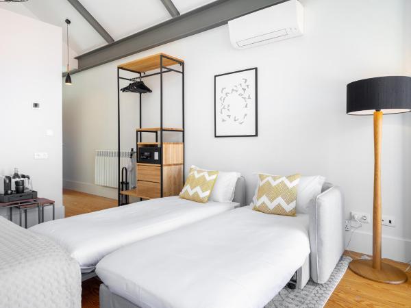 Canto De Luz - Luxury Maison : photo 7 de la chambre chambre double ou lits jumeaux supérieure avec vue sur ville