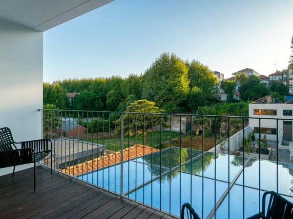 Canto De Luz - Luxury Maison : photo 2 de la chambre chambre double ou lits jumeaux avec balcon