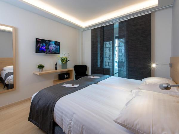 Hotel des Alpes : photo 2 de la chambre chambre lits jumeaux