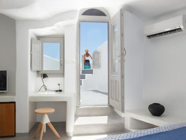Filotera Suites : photo 4 de la chambre suite troglodyte avec jacuzzi extérieur chauffé privé