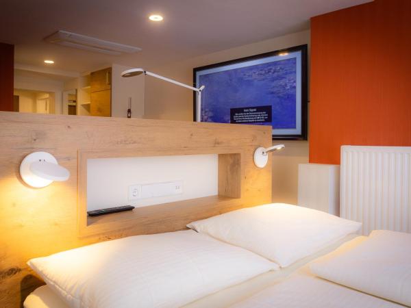 Hotel Azenberg : photo 5 de la chambre chambre quadruple standard