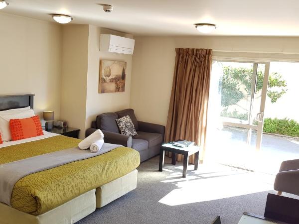 Delago Motel/Apartments : photo 1 de la chambre studio de luxe avec baignoire spa