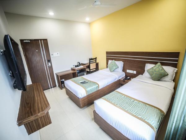 Hotel Golden Leaves : photo 3 de la chambre chambre lits jumeaux