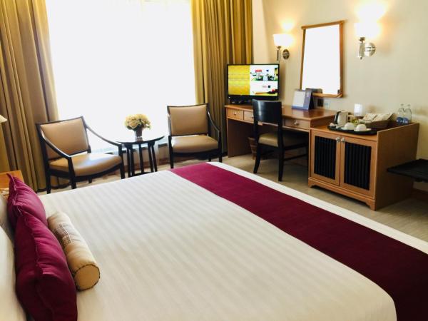 Indra Regent Hotel : photo 5 de la chambre chambre deluxe double ou lits jumeaux