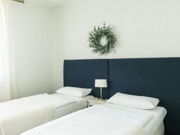 Villa Gdynia : photo 1 de la chambre chambre double ou lits jumeaux