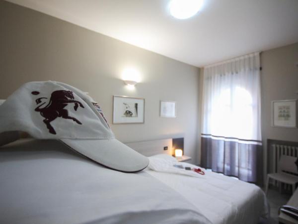 Hotel Gran Torino : photo 4 de la chambre chambre quadruple