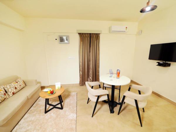 The Altruist Business Hotel Whitefield : photo 8 de la chambre suite lit king-size