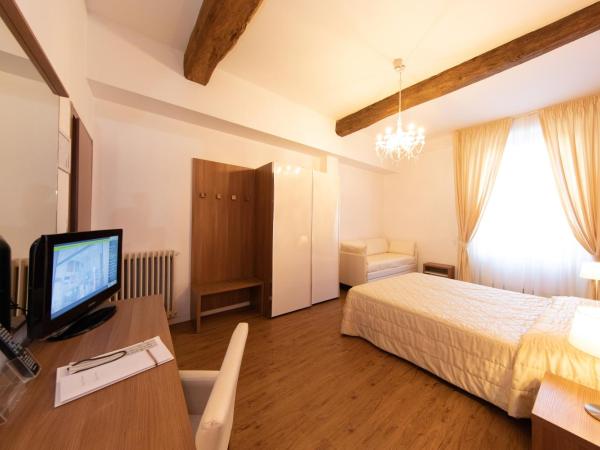 Albergo Rossini 1936 - Small & Charming : photo 2 de la chambre chambre quadruple