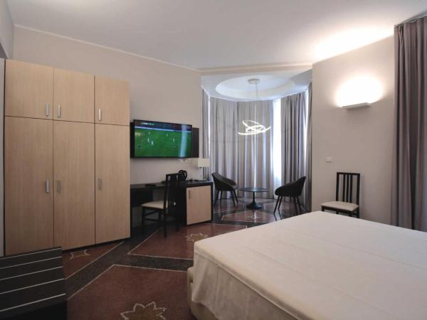 Hotel Vittoria : photo 8 de la chambre suite junior avec balcon